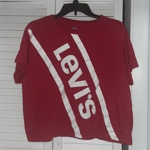 Levi’s Red Shortsleeved Shirt in a medium size.
